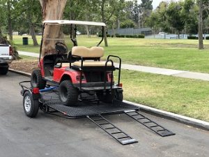 how to tie down a golf cart on a trailer 